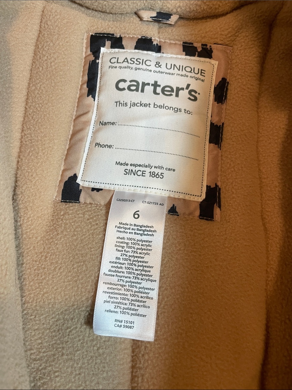 Carter's Snowsuit. Beige with black accent.